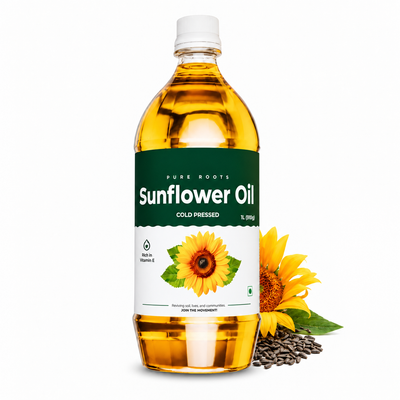 A bottle of Pure Roots Sunflower Oil, cold pressed, 1 Liter, filled with golden yellow oil. The bottle has a dark green and white label with an illustration of a sunflower.