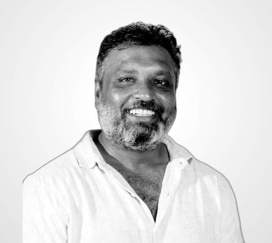 Madhu Chandan, Founder & Chief Executive Officer, Organic Mandya — black and white portrait