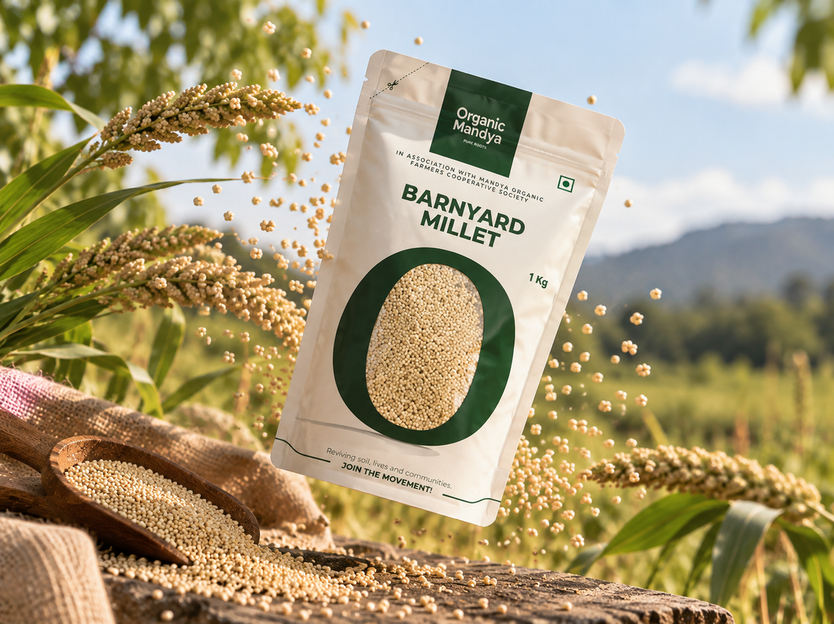Organic Mandya Barnyard Millet pouch floating above a wooden scoop of millet, with millet ears and a sunlit green field behind